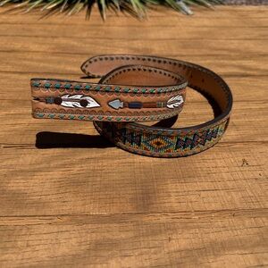 Women’s hand made beaded belt size 34 
Made by hurricane leather.